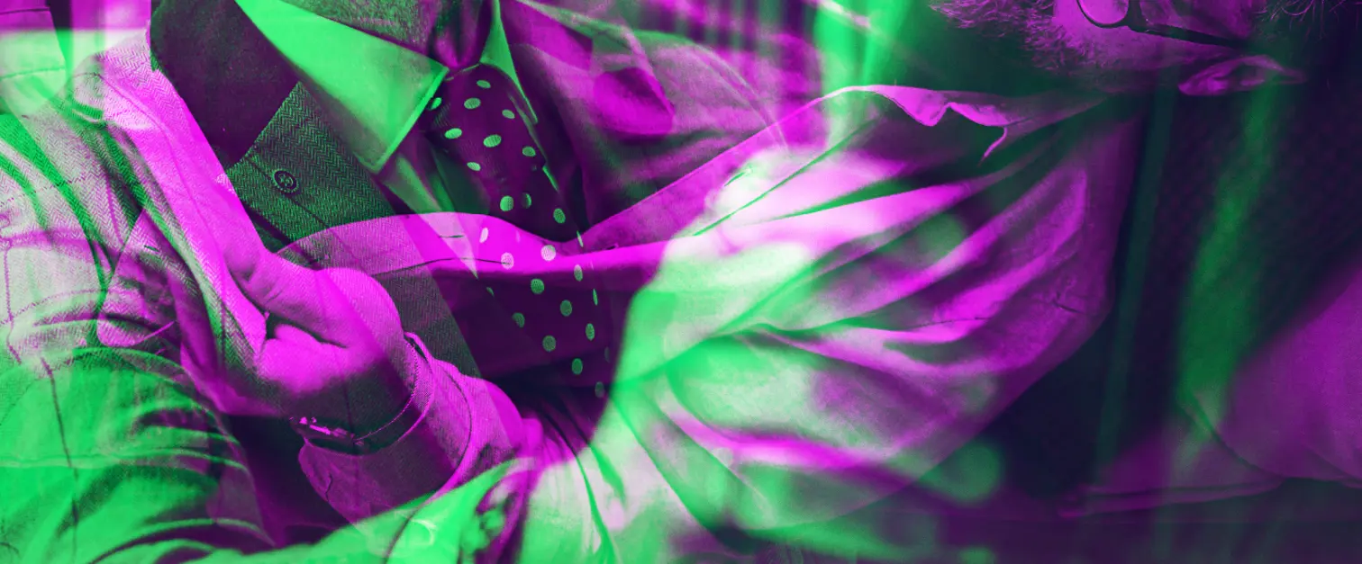 Man with glasses and a beard reclines on a sofa, looking upward. The same man appears again in a second layered view. The image features strong pink and green colour overlays and abstract visual effects.