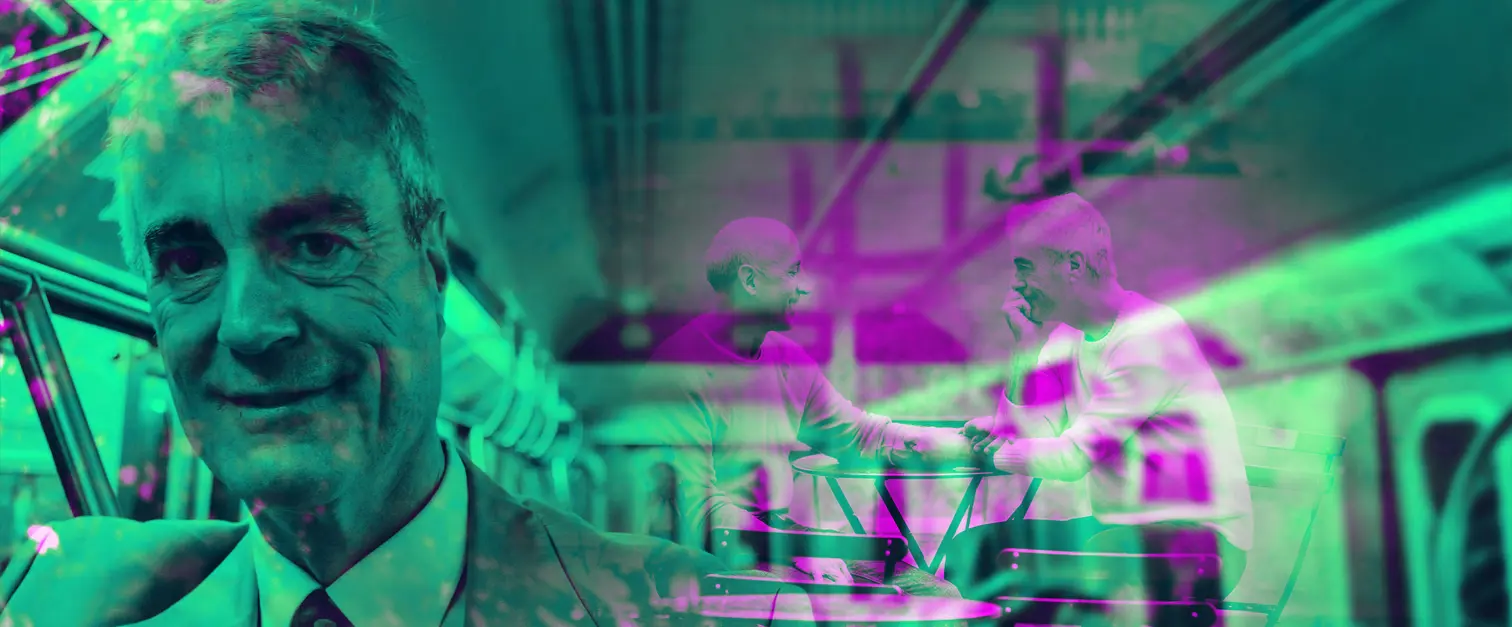 Close-up of an older man wearing a suit and tie, standing inside a train carriage. Overlaid in the background is the same man sitting at a small outdoor table with another person. The image uses coloured overlays and layered visual effects.